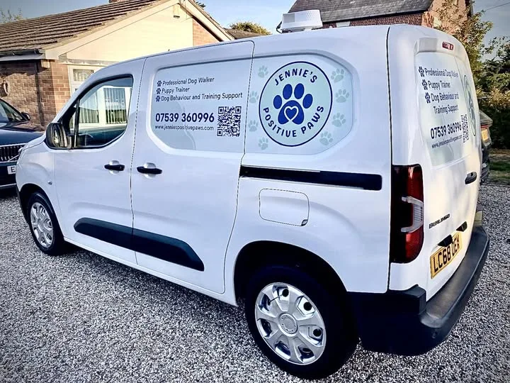 Jennie's Positive Paws dog walking van with branded signage in South Woodham Ferrers